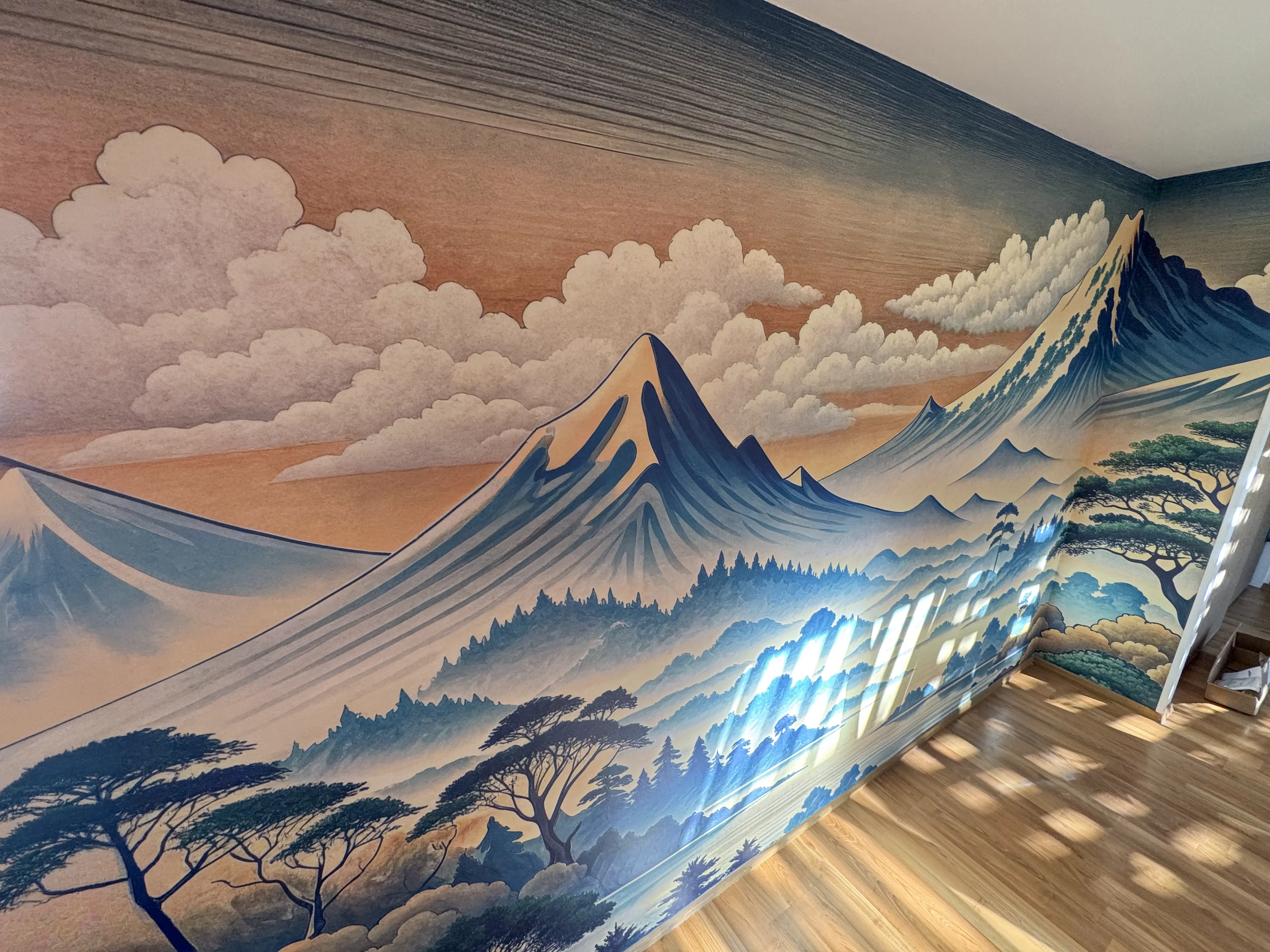 Mountain landscape mural wallpaper installation in Los Angeles